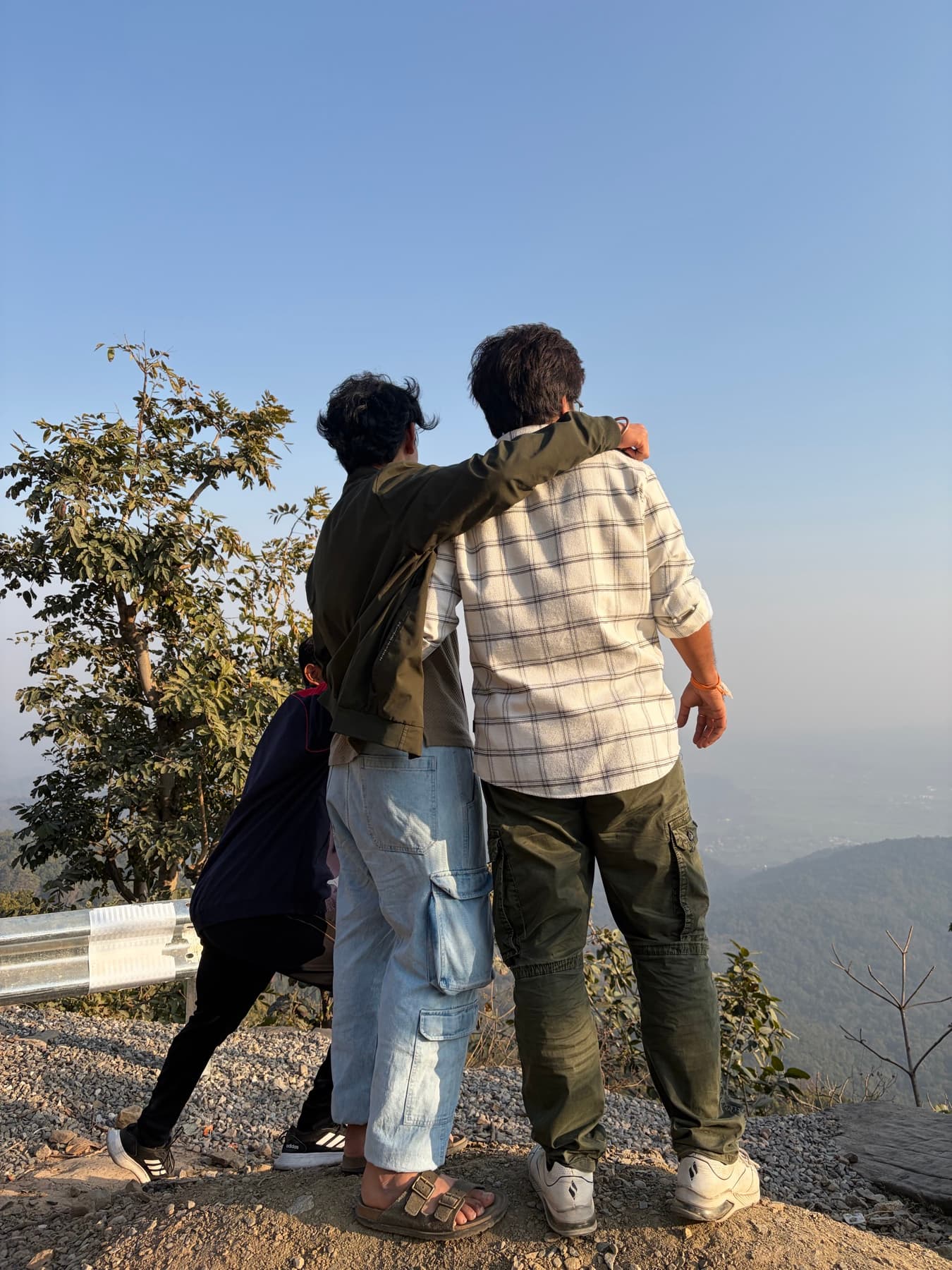 Friends looking at a mountain view