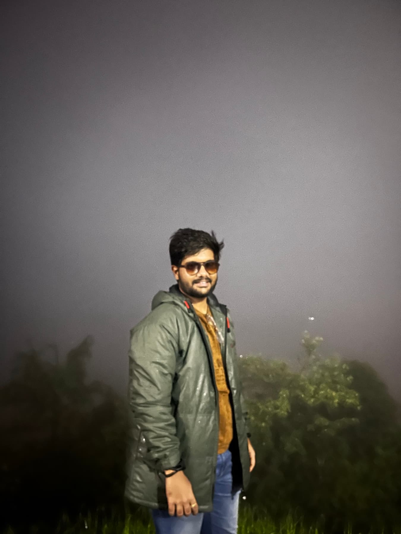 Mohit standing in misty weather